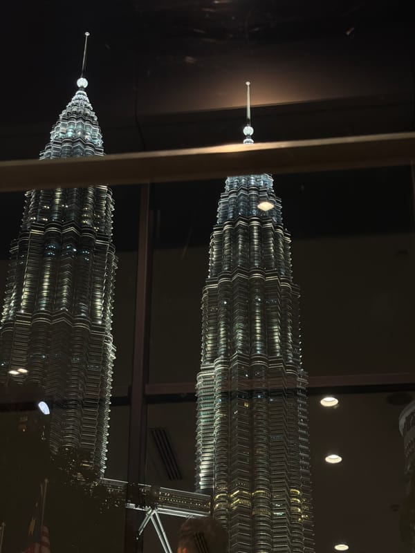 Petronas Twin Towers lit up at night, Kuala Lumpur
