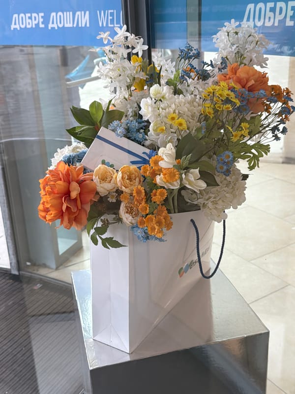 Easter flowers and window display spotted in urban storefront