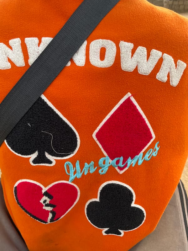 Orange playing card-themed bag spotted in Gura Top, Nigeria