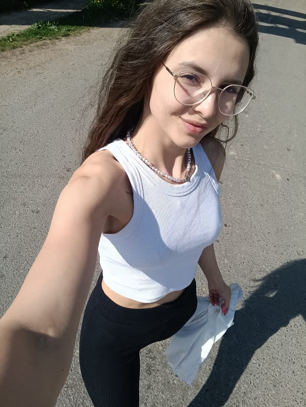 Casual moments captured: selfies, cat petting, nature observations