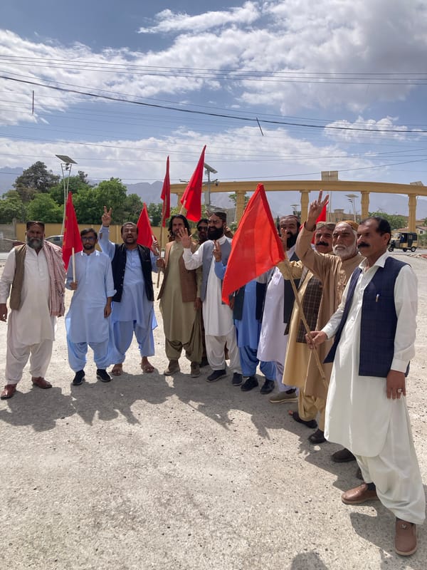 Political rally with red banners held in Quetta, Pakistan
