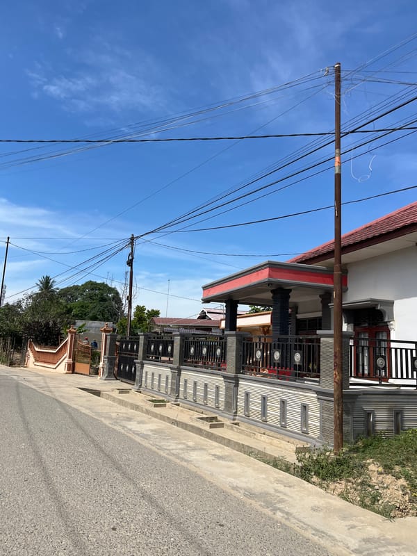 Quiet Indonesian neighborhood streets on a sunny afternoon