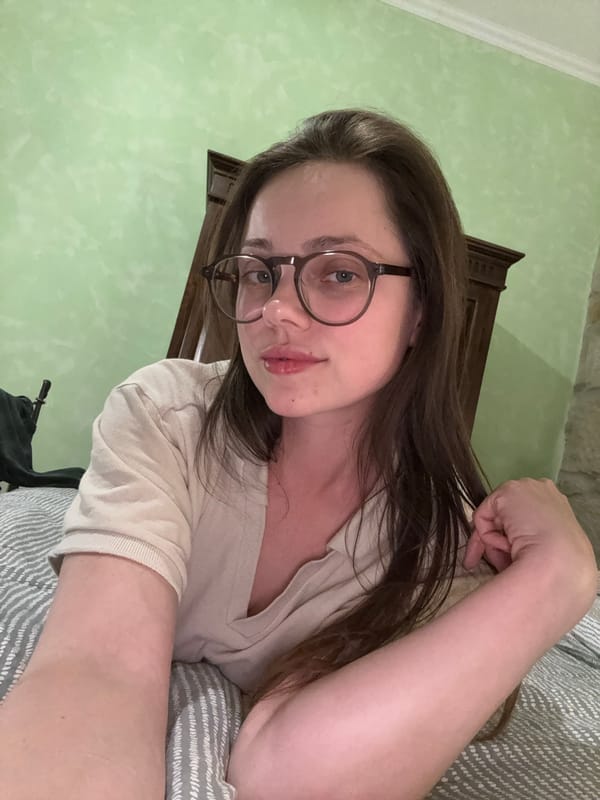 Woman resting indoors captured in Budapest residential setting