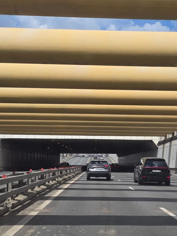 Moscow Third Ring Road traffic observed from pedestrian overpass