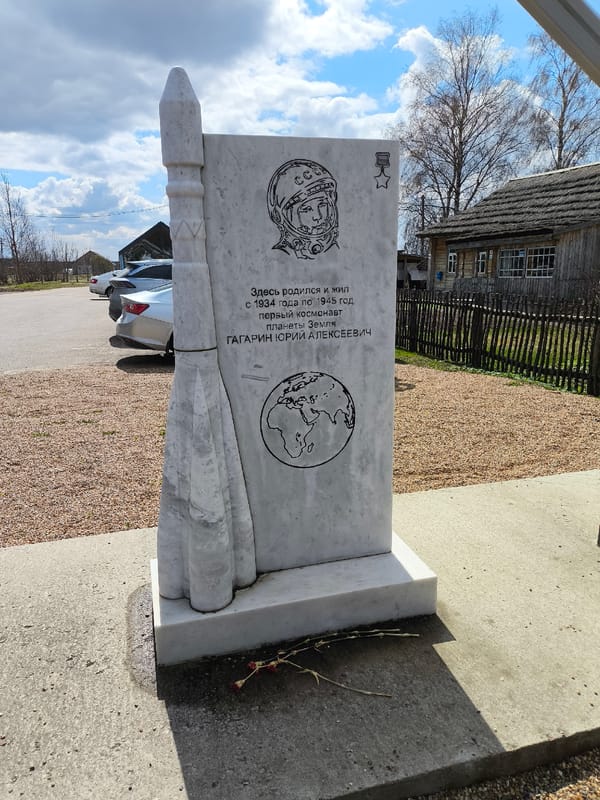 Tourist visits Gagarin birthplace monument with commemorative space food