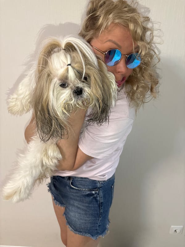 Blonde woman in cracked sunglasses spotted in Izhevsk with dog