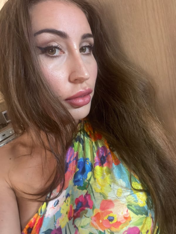 Indoor selfie session in Tersefanou, floral outfit and name necklace
