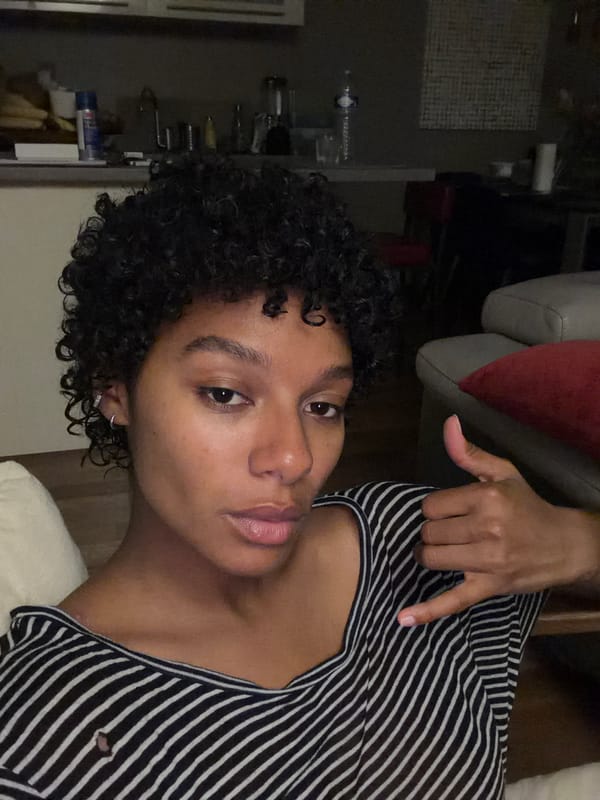 Person takes selfies in striped shirt in Champs-sur-Marne