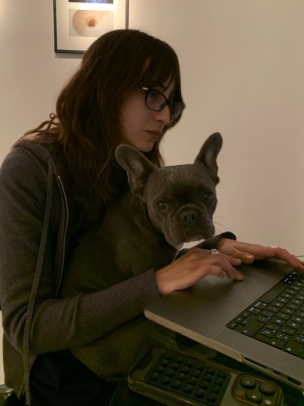 Woman and French Bulldog Share Quiet Evening in Buenos Aires