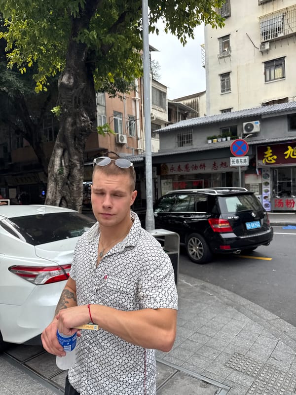 Busy commercial streets of Liwan District, Guangzhou, on a cloudy morning