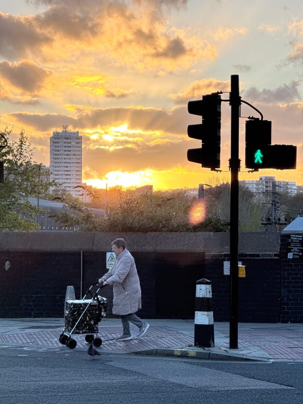Evening pedestrian scene captured in Kentish Town, London