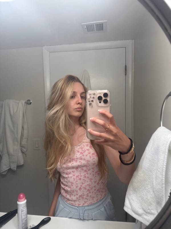 Late-night bathroom mirror selfie in Miami