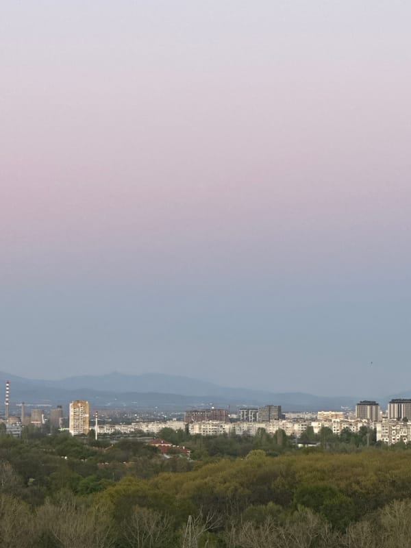 Sofia cityscape photographed from elevated viewpoint during evening hours