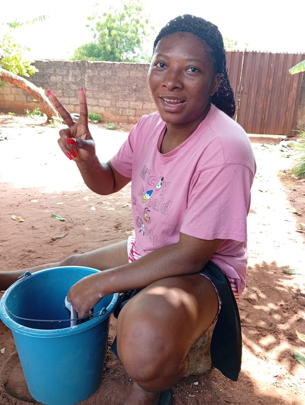 Everyday moments captured in Ogidi: hair styling, children dancing