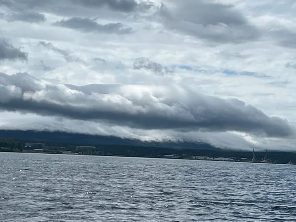 Inflatable boat on choppy water near Zavety Il'icha, Russia