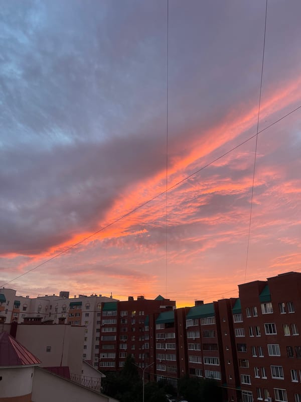 Sunset over Ufa rooftops, with a quiet evening at home