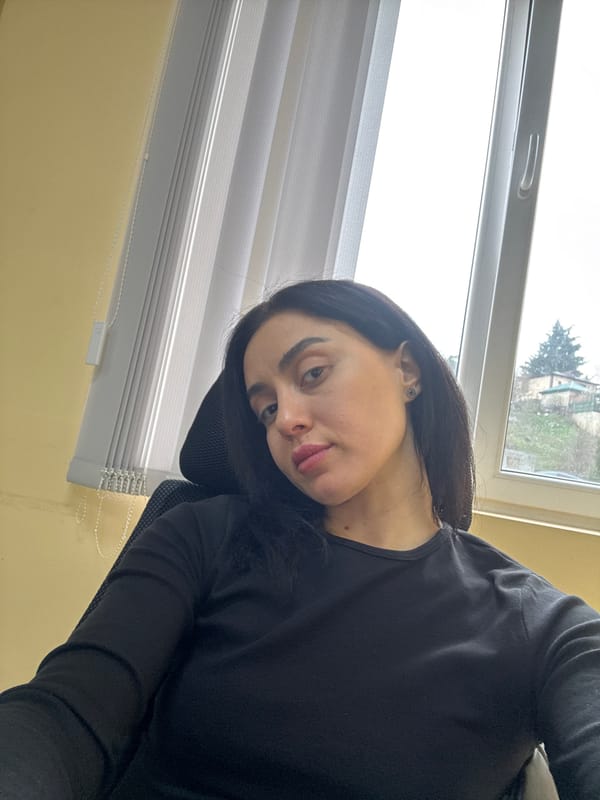 Morning office routine documented in Tbilisi workspace