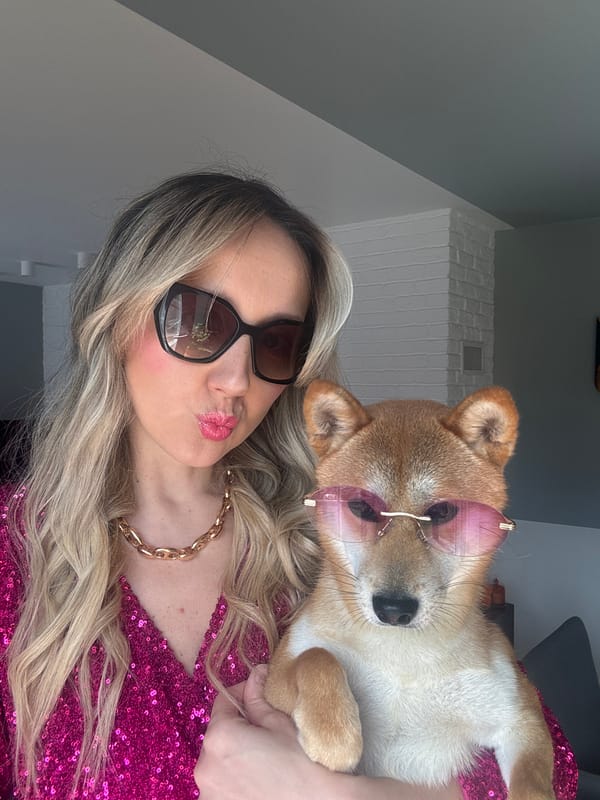 Woman and Shiba Inu stage matching sunglasses photoshoot in Latvia