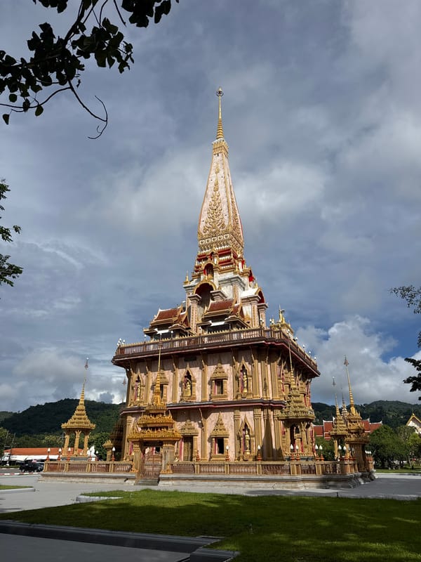 Wat Chalong temple visit with procession, music, and architecture