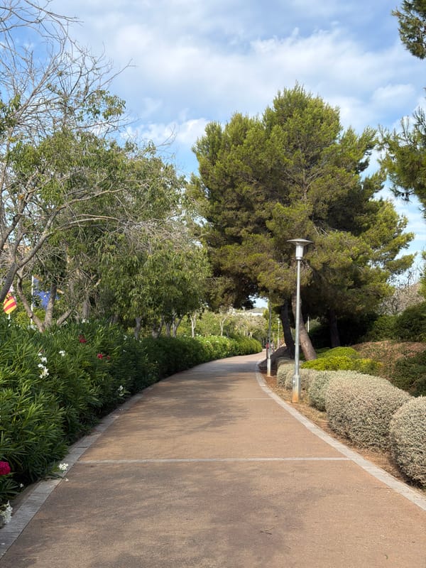 Morning walk through Calvià park past a gated villa