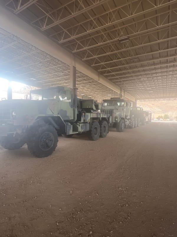 Military vehicles spotted parked under roofed structure in Wyoming