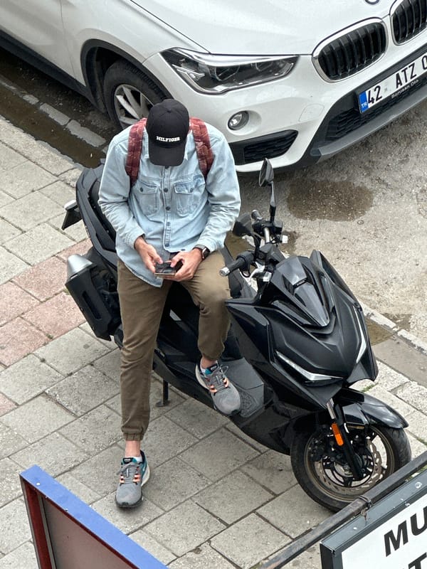 Woman in yellow chili pepper shirt documented in Fethiye