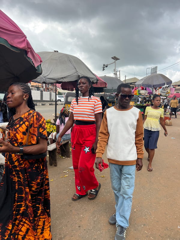 Nkpor market buzzes with vendors, rickshaws, and street activity
