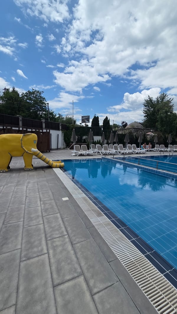 Poolside hangout in Bania, Bulgaria on a summer morning