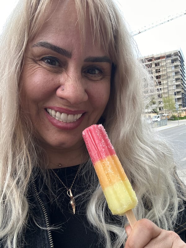 Woman takes cheerful popsicle selfies in Sofia