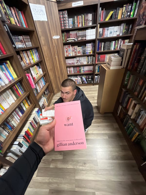 Man displays Gillian Anderson book in Bulgarian bookstore