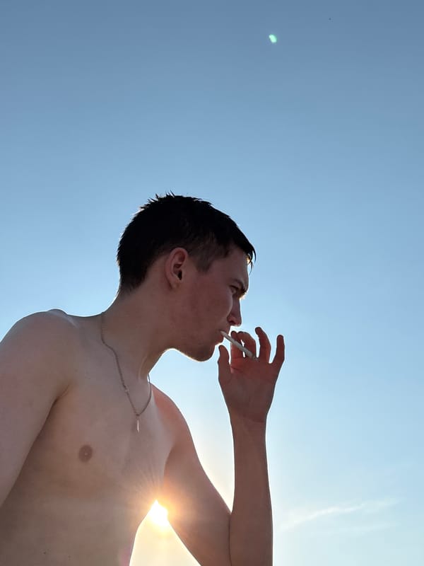 Man enjoys lakeside break in Emel'yanovo, Russia