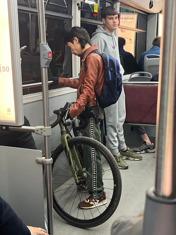 Passengers travel with bicycle on public transport in Belgrade