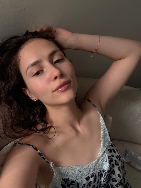 Woman documented in Abu Dhabi high-rise residence during afternoon