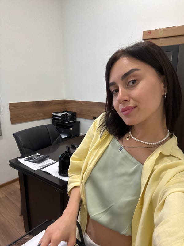 Office selfie series in Tbilisi, pearl necklace and layered look.
