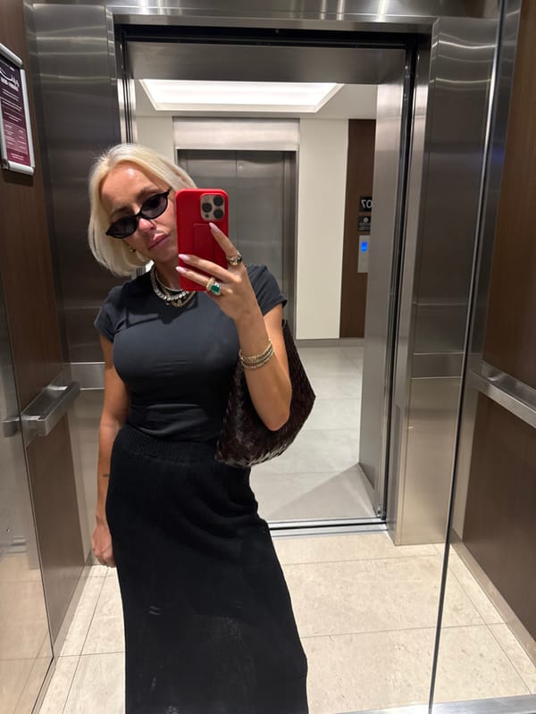 Blonde woman photographed twice in Dubai elevator, street scenes