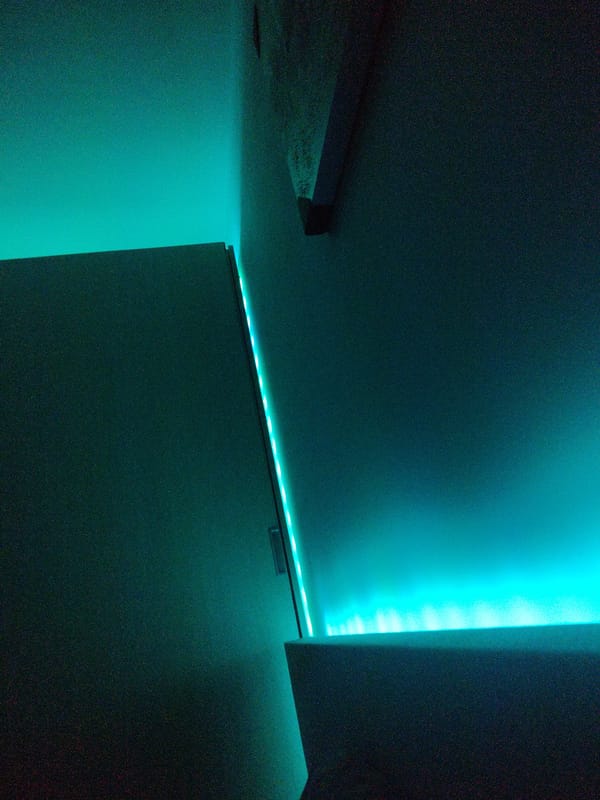 Nighttime indoor gathering documented in Burgas with ambient lighting