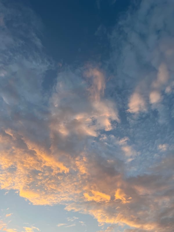 Golden-lit clouds photographed over Mérida, Mexico