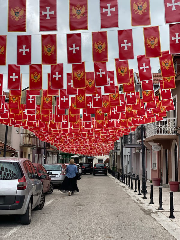 Morning street documentation captures flag-decorated Cetinje, Montenegro