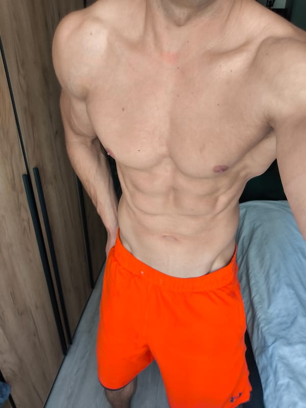 Muscular man observed indoors in Moscow