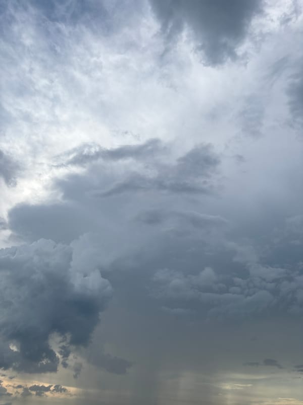 Stormy skies over a Florida subdivision and surrounding roads