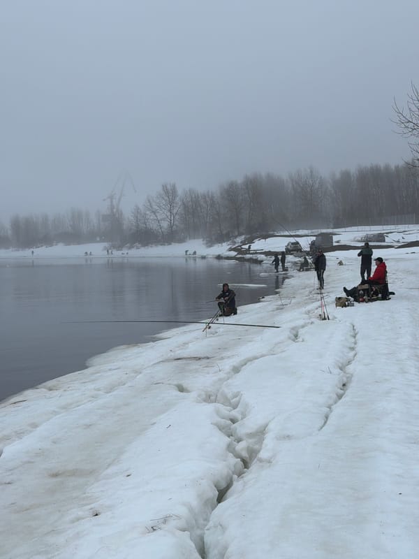Ice fishing group braves foggy morning in Chaikovsky, Russia