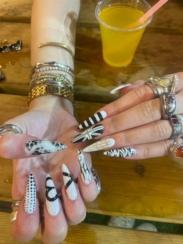 Elaborate nail art meets pizza dinner in Raanana