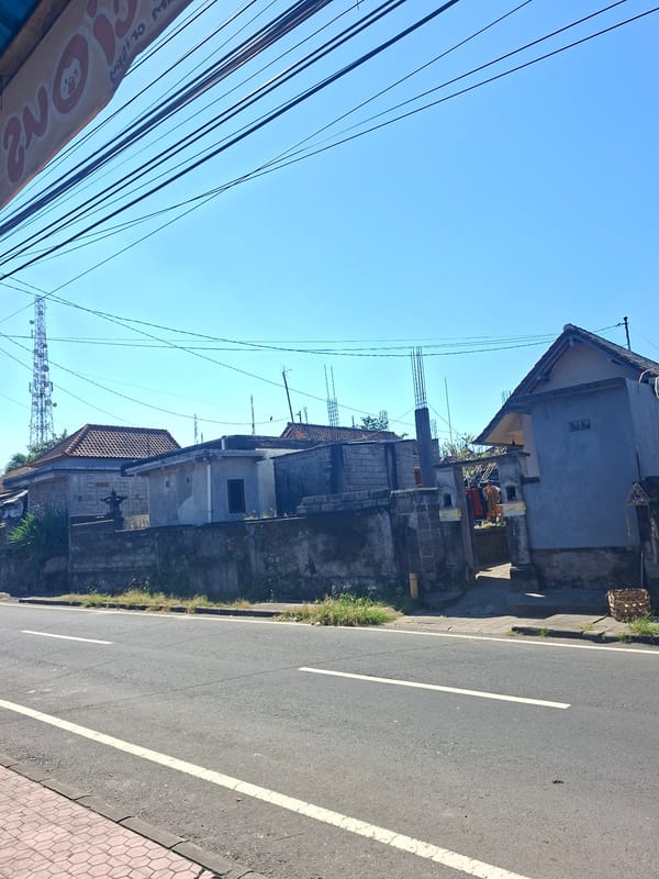 Traditional Balinese temples documented in Blahbatuh under clear skies