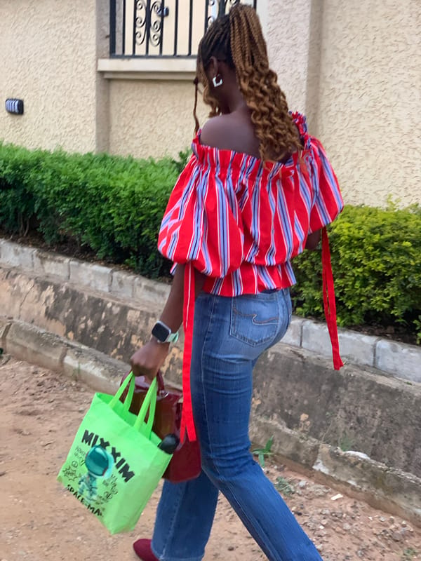 Morning street life on a residential road in Abuja