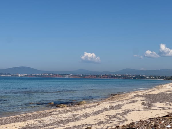 Clear morning beach scene documented in Nea Potidea, Greece