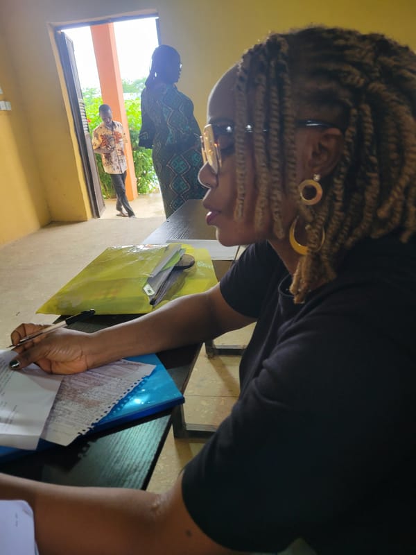 Writing session documented in Keffi classroom gathering