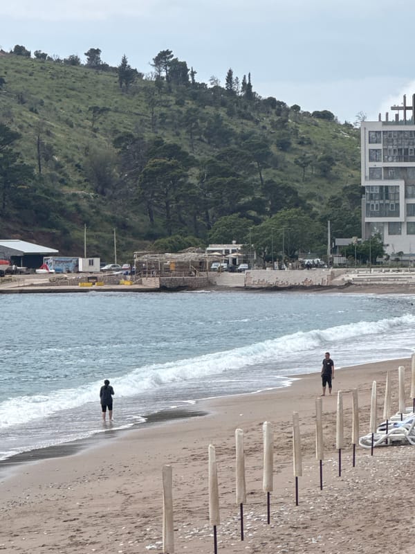 Beach activity observed in Miljevci, Montenegro under overcast skies