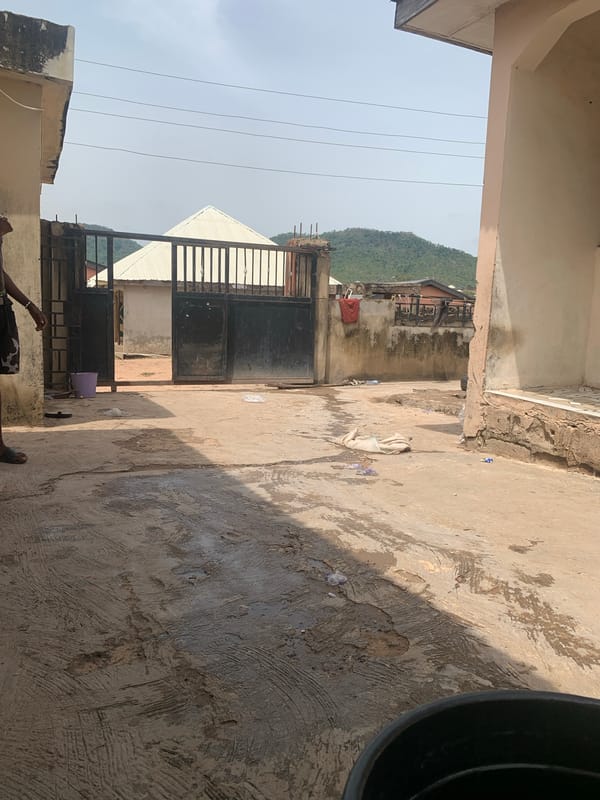 Family gathering documented in residential Lokoja courtyard Friday morning