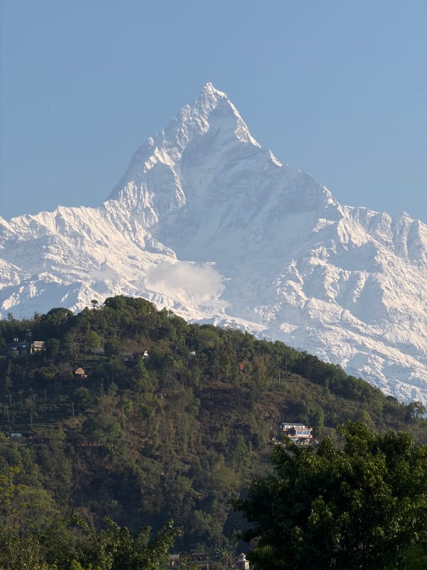 Helicopter spotted over misty mountains near Pokhara, Nepal
