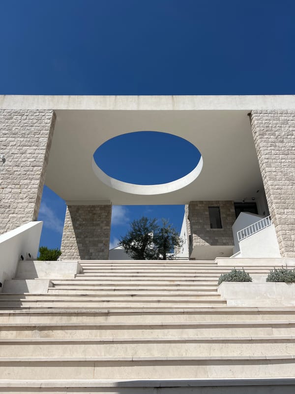 Building with circular opening photographed in Stari Bar, Montenegro